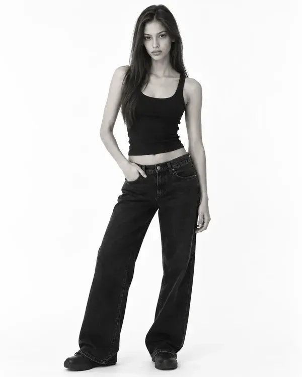 Three black and white photos of a model with long dark hair in a black top and jeans, the kind of photos to send in an agency submission